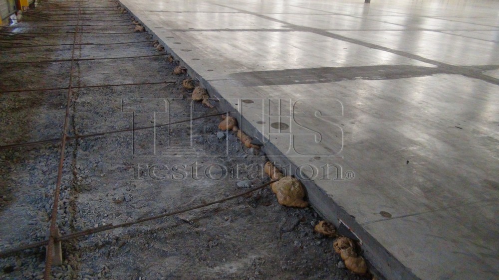 Industrial Concrete slabs are injected underneath the slab to level the concrete floor. 